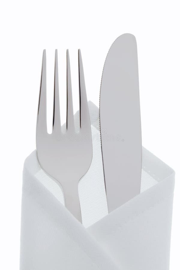 Knives, forks and plates stock photo. Image of silverware 19833774