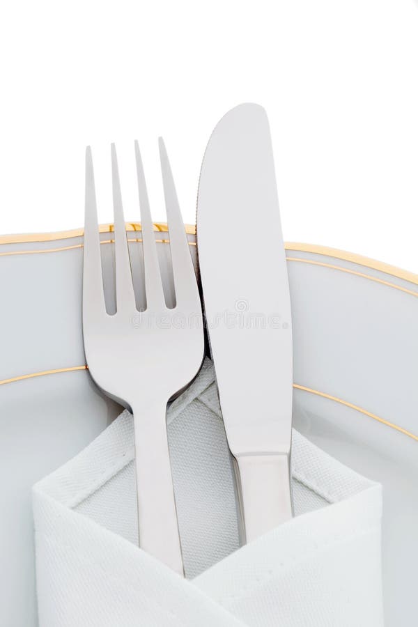 Knives, forks and plates stock image. Image of catering 19914301