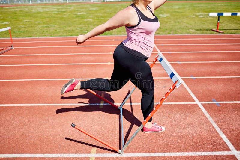 Knocking down hurdle stock image. Image of challenge 97168099