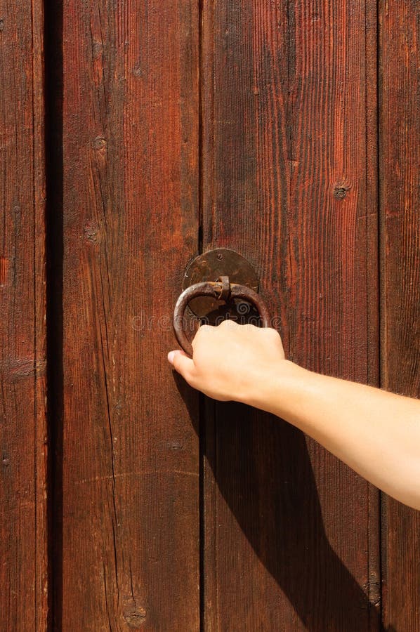 Knocking on a wooden door stock image. Image of countryside 35458791