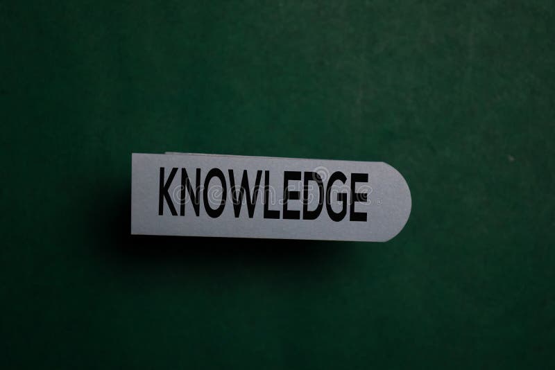 Knowledge write on a sticky note isolated on Office Desk