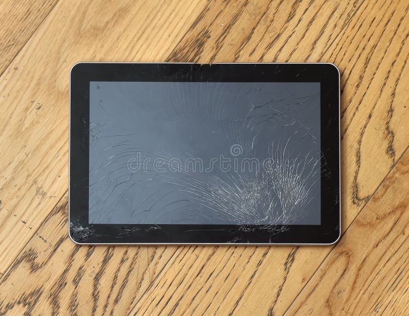 Knäckt tablet royaltyfri fotografi Knäckt tablet royaltyfri fotografi