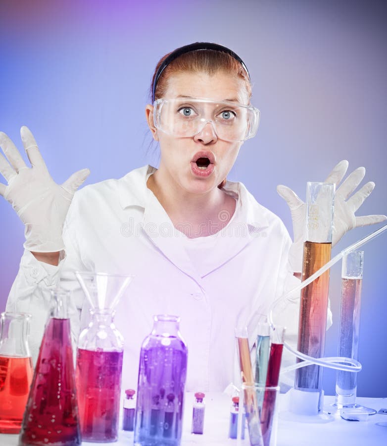 Woman scientist in laboratory with glass tubes. Woman scientist in laboratory with glass tubes