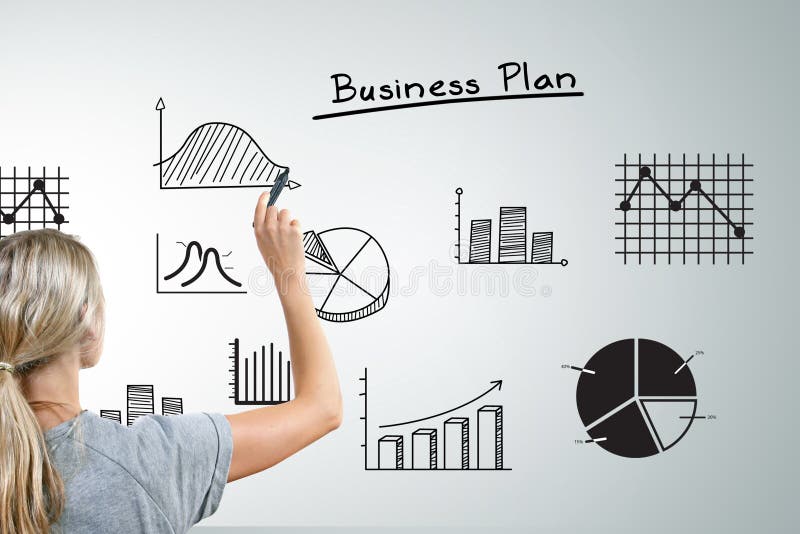 Woman drawing different business plan graphs and charts with black marker. Woman drawing different business plan graphs and charts with black marker