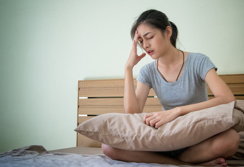 Young pregnant woman feeling unwell , suffering from morning sickness. Young pregnant woman feeling unwell , suffering from morning sickness.