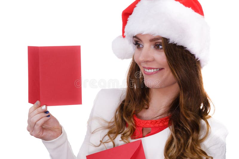 Kobieta w Santa Claus czytania kapeluszowym li?cie obrazy stock Kobieta w Santa Claus czytania kapeluszowym li?cie obrazy stock