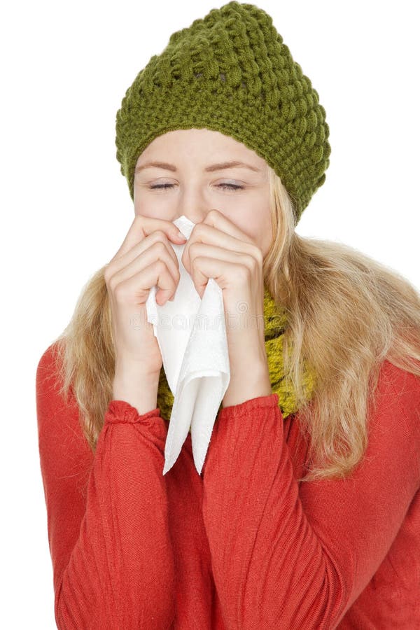 Blonde young woman with handkerchief catches a cold. Blonde young woman with handkerchief catches a cold