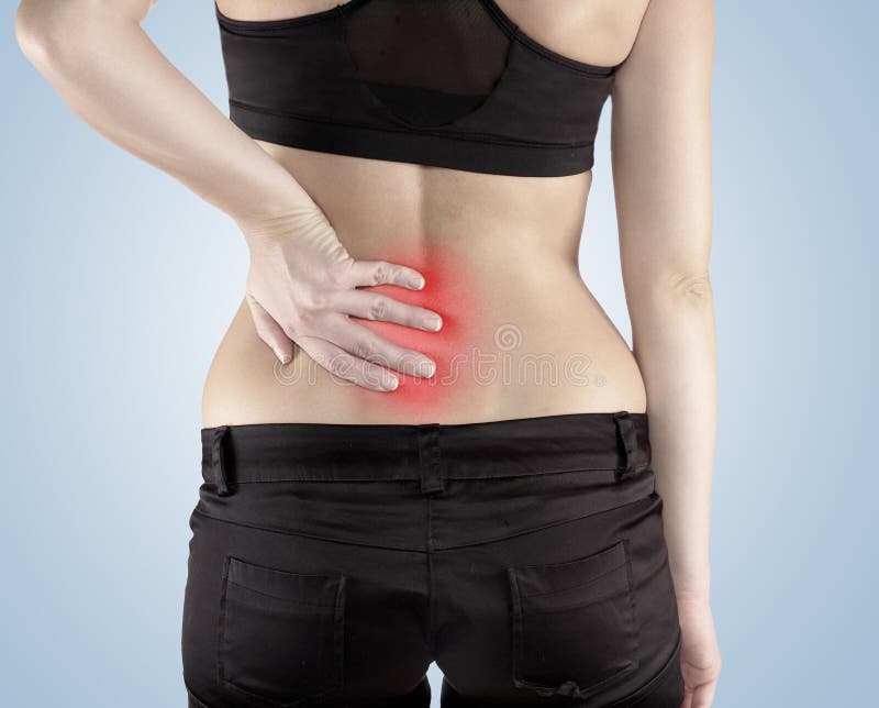 Woman with both palm around back to show pain and injury on back area. Medical health care concept. Woman with both palm around back to show pain and injury on back area. Medical health care concept.