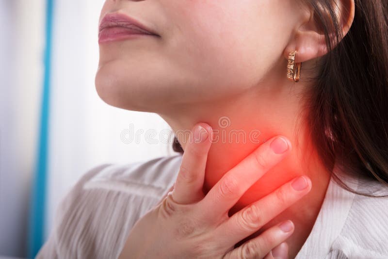 Close-up Of A Woman`s Hand Touching Her Sore Throat. Close-up Of A Woman`s Hand Touching Her Sore Throat