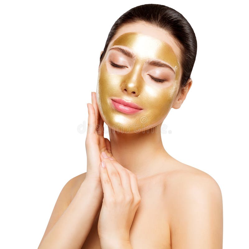 Woman Gold Mask, Beautiful Model with Golden Skin Cosmetic touch Face, Beauty Skincare and Treatment, Shot over white studio background. Woman Gold Mask, Beautiful Model with Golden Skin Cosmetic touch Face, Beauty Skincare and Treatment, Shot over white studio background