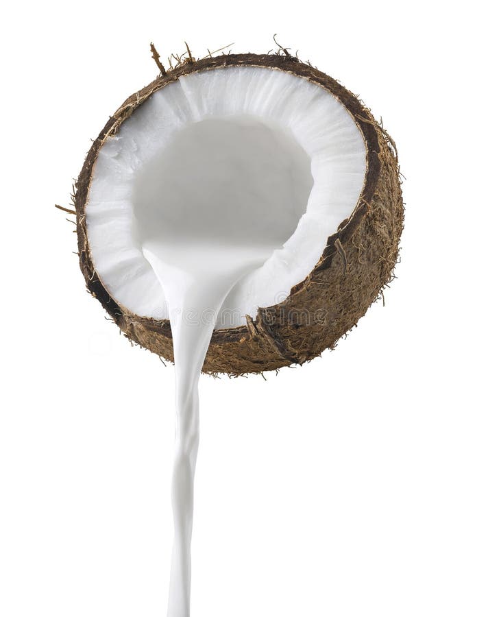 Kokosowy mleko nalewa bocznego widok odizolowywającego na białym tle