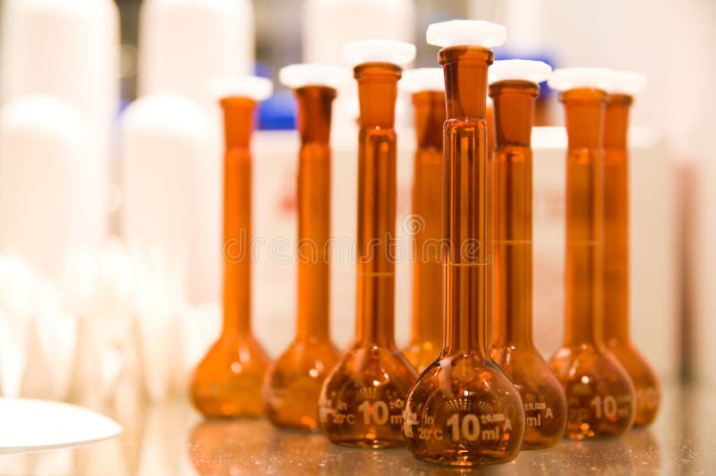 Laboratory flasks on the table. Laboratory flasks on the table