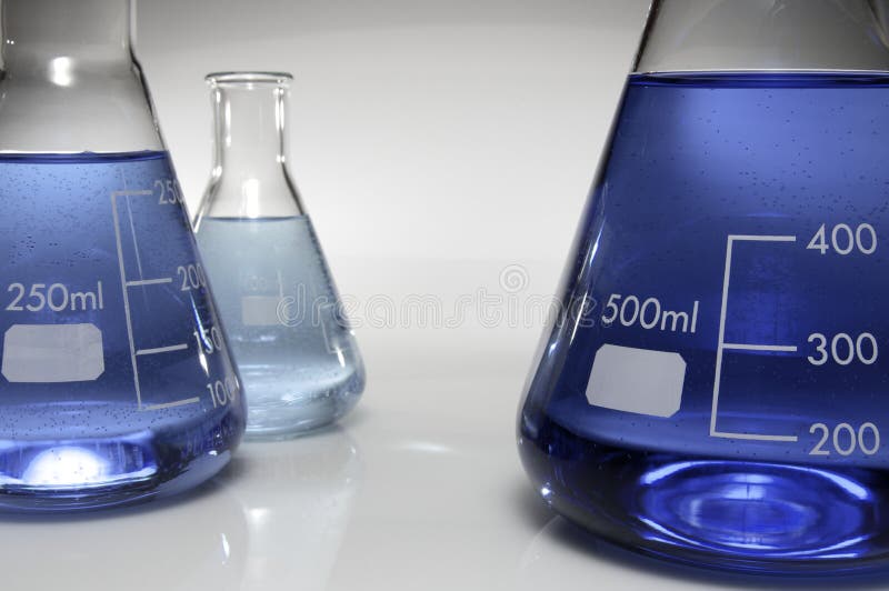 Three conical flasks with liquid blue and white background. Three conical flasks with liquid blue and white background