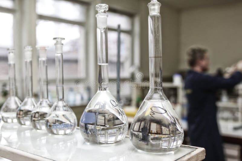 Volumetric flasks in scientific laboratory. Volumetric flasks in scientific laboratory