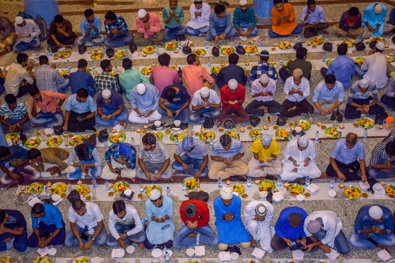 KOLKATA , INDIA - MAY 24, 2019: This is Iftar party.This Iftar party was organised at Aliah University.ftar, also known in English as fatoor, is the evening meal with which Muslims end their daily Ramadan fast at sunset. They break their fast at the time of the call to prayer for the evening prayer. KOLKATA , INDIA - MAY 24, 2019: This is Iftar party.This Iftar party was organised at Aliah University.ftar, also known in English as fatoor, is the evening meal with which Muslims end their daily Ramadan fast at sunset. They break their fast at the time of the call to prayer for the evening prayer