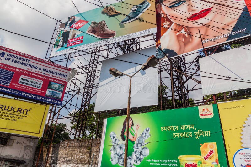 KOLKATA, INDIA OCTOBER 31, 2016 Wall of Posters and Billbards in the Center of Kolkata, Ind