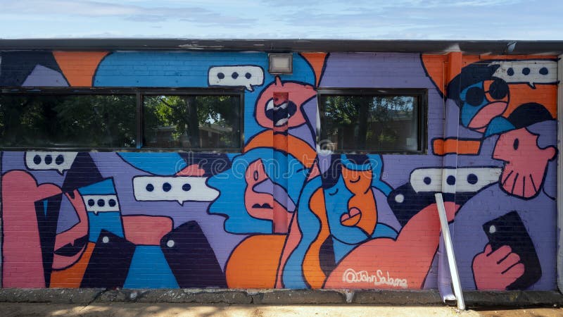 Kolorowe graffiti styl malowidła w uliczce ściany plaza w oklahoma. royalty ilustracja