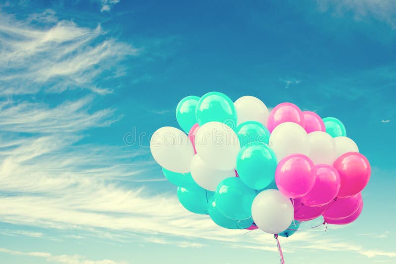 Colorful balloons with a retro instagram filter effect, concept of happy birthday in summer and wedding honeymoon party. Colorful balloons with a retro instagram filter effect, concept of happy birthday in summer and wedding honeymoon party