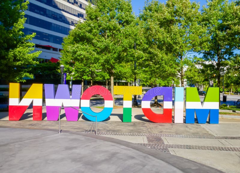 A colorful sign that spells Midtown in Atlanta Georgia This sign is on a sunny spring day. A colorful sign that spells Midtown in Atlanta Georgia This sign is on a sunny spring day