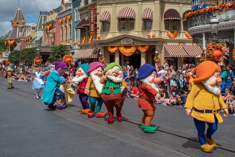 Orlando, Florida. September 25, 2019. Colorful Seven Dwarfs in Disney Festival of Fantasy Parade at Magic Kigndom 1. Orlando, Florida. September 25, 2019. Colorful Seven Dwarfs in Disney Festival of Fantasy Parade at Magic Kigndom 1