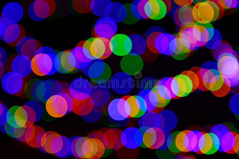 Koloru bokeh zamazani okręgi na czarnym tle fotografia stock Koloru bokeh zamazani okręgi na czarnym tle fotografia stock