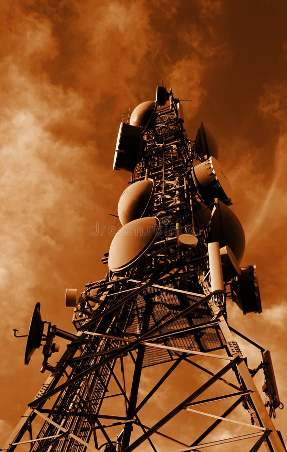 A dark tone sepia conversions on a busy communications relay tower. A dark tone sepia conversions on a busy communications relay tower.