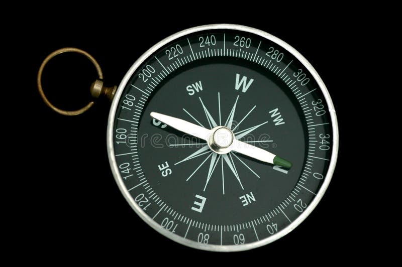 A single compass on black background with the pointer point to the north direction. A single compass on black background with the pointer point to the north direction.