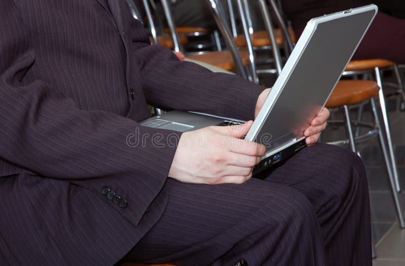 Man working with portable computer as universal concept for many application. Man working with portable computer as universal concept for many application