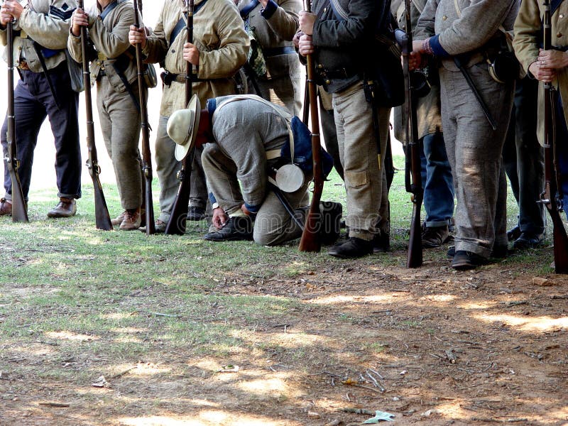 Soldiers standing in line to be inspected. Soldiers standing in line to be inspected