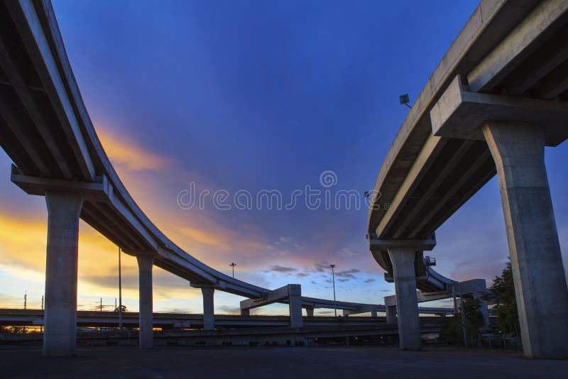 Concrete structure of express way against beautiful dusky sky use for infra structure and public construction theme. Concrete structure of express way against beautiful dusky sky use for infra structure and public construction theme