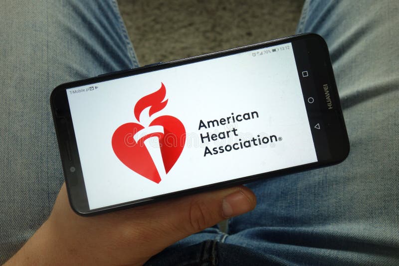 Man holding smartphone with American Heart Association AHA logo