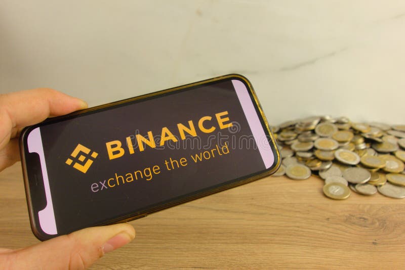 KONSKIE, POLAND - March 20, 2022: Binance cryptocurrency exchange logo on mobile phone stock photography