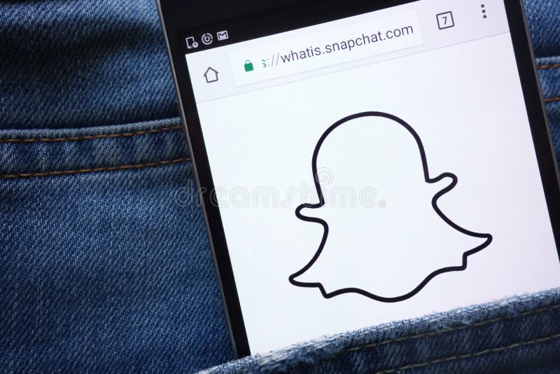 Snapchat website displayed on smartphone hidden in jeans pocket stock photography Snapchat website displayed on smartphone hidden in jeans pocket stock photography