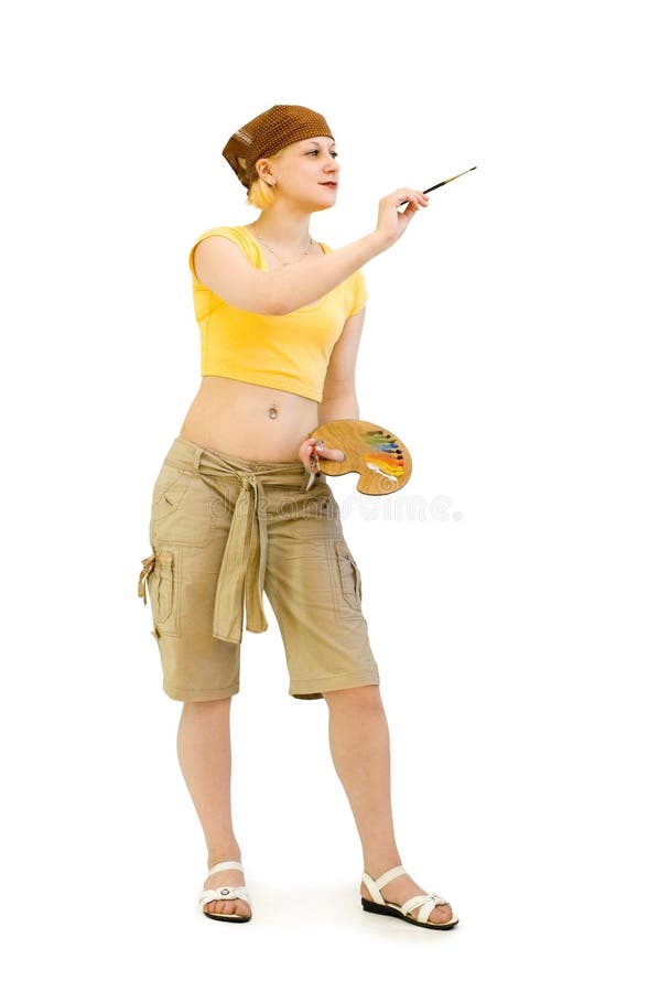 Kvinnlig konstnär målar arkivbilder