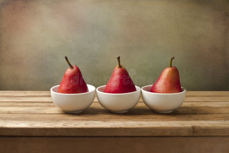 Konststilleben med röda pears