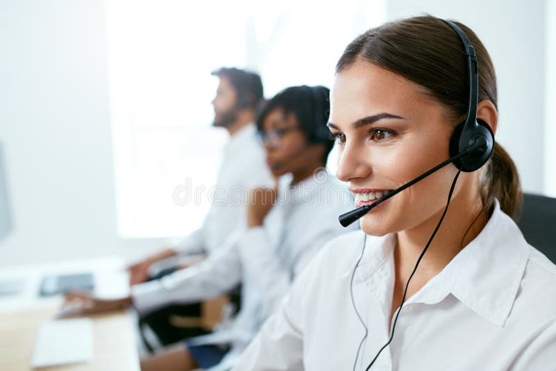 Contact Center Operator Working In Office. Attractive Woman Consulting Customers Online. High Resolution. Contact Center Operator Working In Office. Attractive Woman Consulting Customers Online. High Resolution