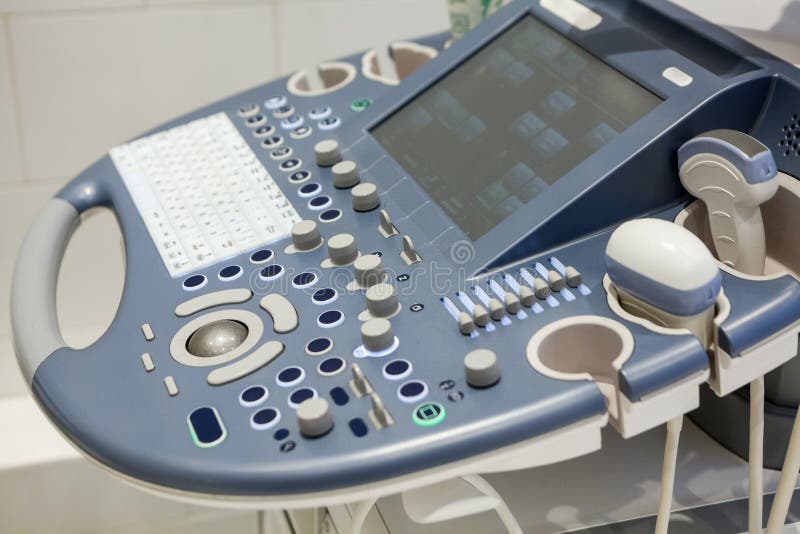 Kontrollbord med knappar och strömbrytare av ultraljudsundersökningapparaturen royaltyfri foto Kontrollbord med knappar och strömbrytare av ultraljudsundersökningapparaturen royaltyfri foto