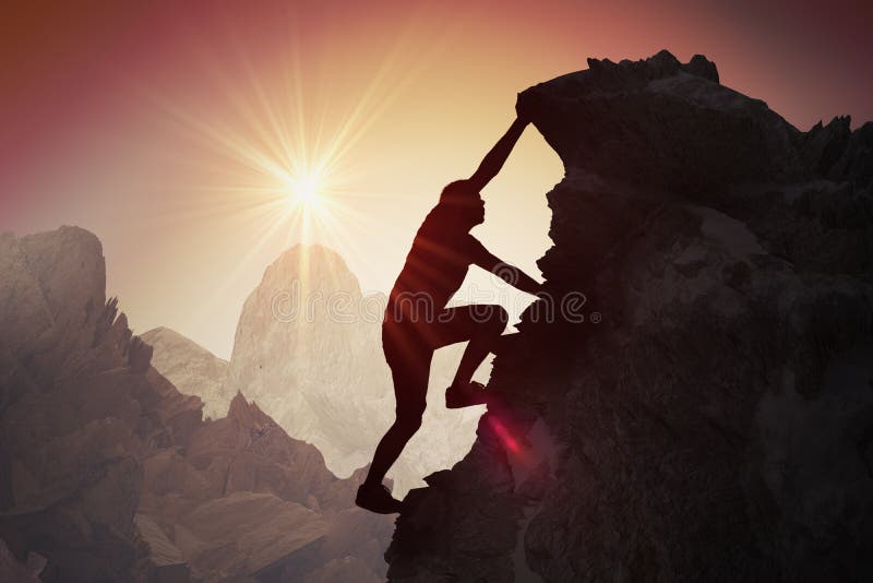 Silhouette of young man climbing on mountain. Silhouette of young man climbing on mountain.