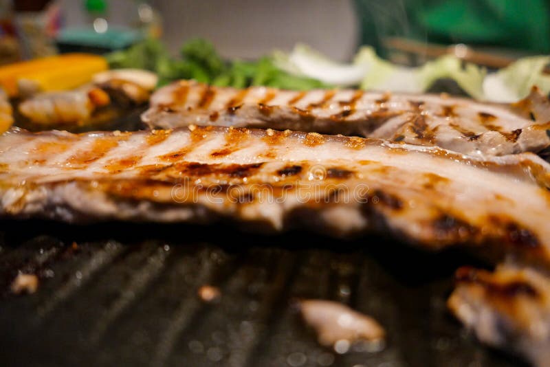 Korean Barbecue with Fresh Vegetables, Fish and Meat. Stock Photo