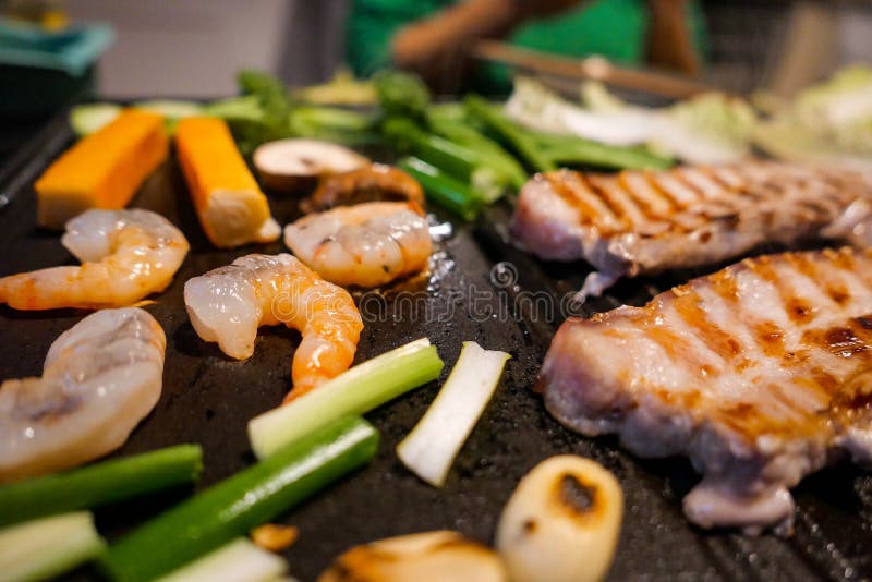 Korean Barbecue with Fresh Vegetables, Fish and Meat. Stock Photo Image of meat, produce