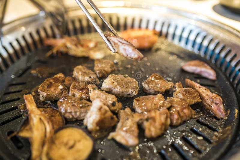 Korean Barbecue Meat Are Being Cooked On Stove Stock Photo Image Of Color Kimchi