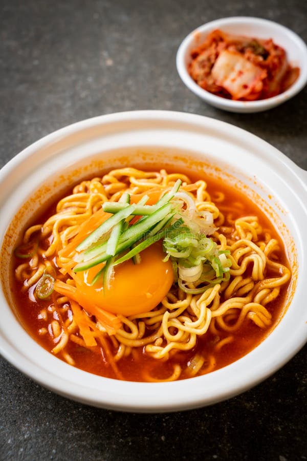 Korean Spicy Instant Noodles with Egg, Vegetable and Kimchi Stock Photo