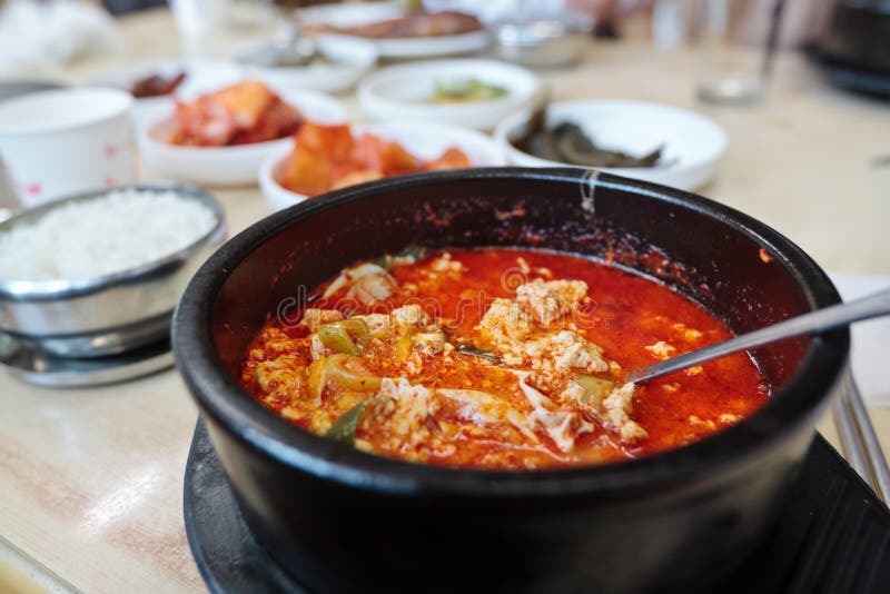 Korean spicy tofu soup sundubu jjigae in a hot pot