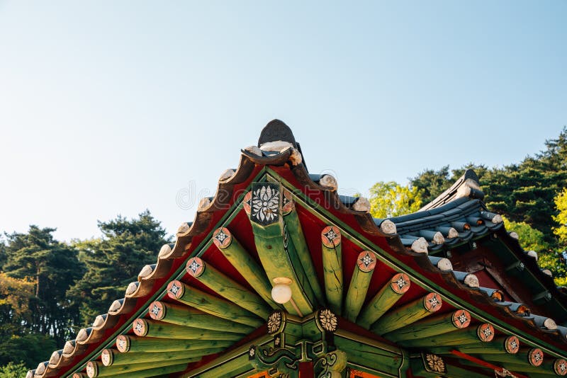 Korean traditional wooden roof eaves at Seoknamsa temple in Anseong, Korea