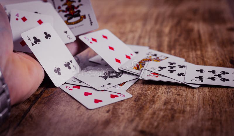Kort i tabell| Uppspelningskort| Fyra standardsocklar| Spel arkivbild Kort i tabell| Uppspelningskort| Fyra standardsocklar| Spel arkivbild