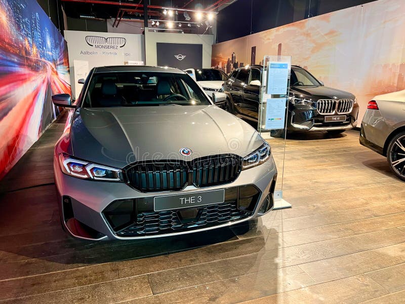 Kortrijk, Belgium - 04.13.2024: New BMW 3 car in the showroom. Kortrijk, Belgium - 04.13.2024: New BMW 3 car in the showroom.