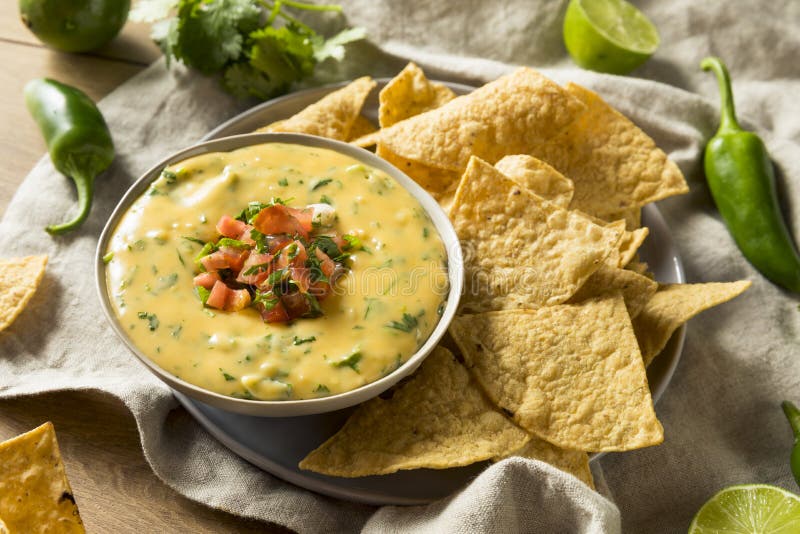 Spicy Homemade Cheesey Queso Dip with Tortilla Chips. Spicy Homemade Cheesey Queso Dip with Tortilla Chips