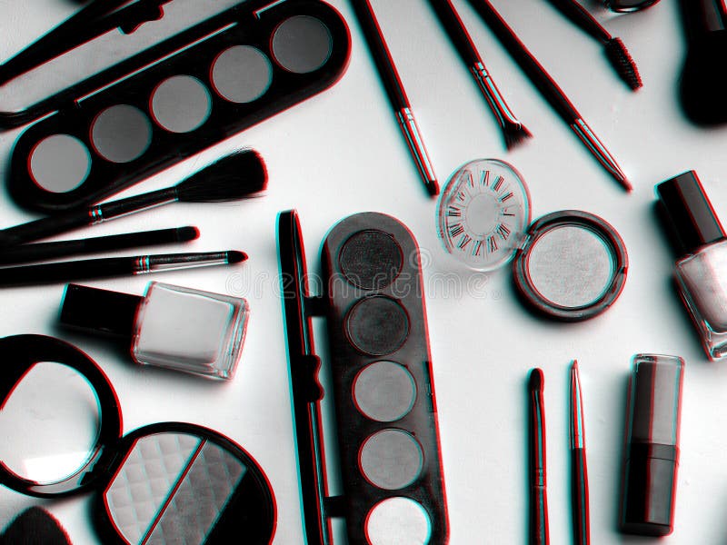Women`s cosmetics and makeup set on pink background. Top view, flat lay collage. Black and white photo with 3D glitch effect. Women`s cosmetics and makeup set on pink background. Top view, flat lay collage. Black and white photo with 3D glitch effect