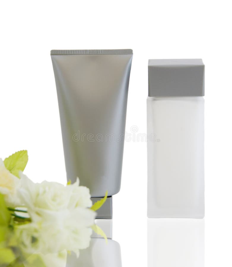 Cosmetic products with no brand with reflections, on white background. Cosmetic products with no brand with reflections, on white background