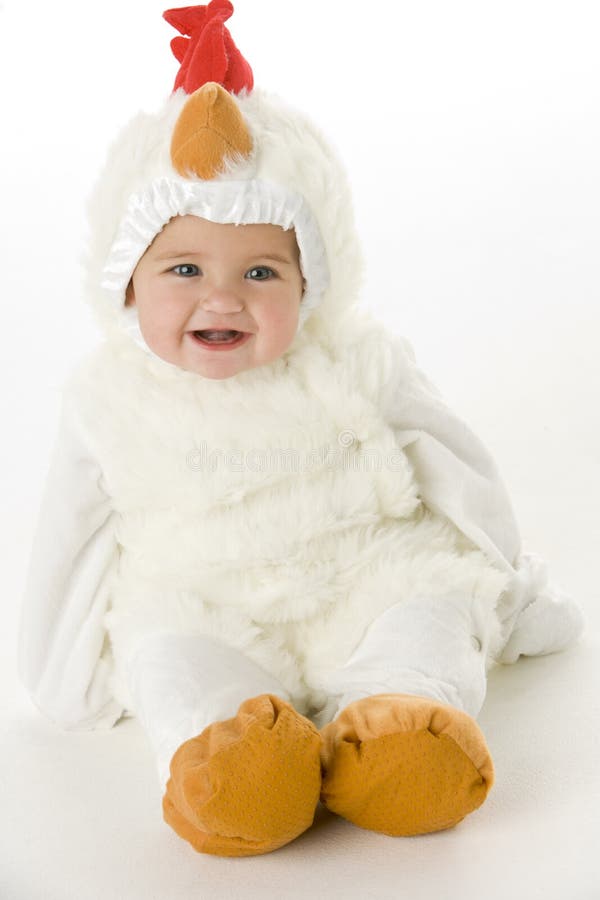Baby in chicken costume on white background. Baby in chicken costume on white background